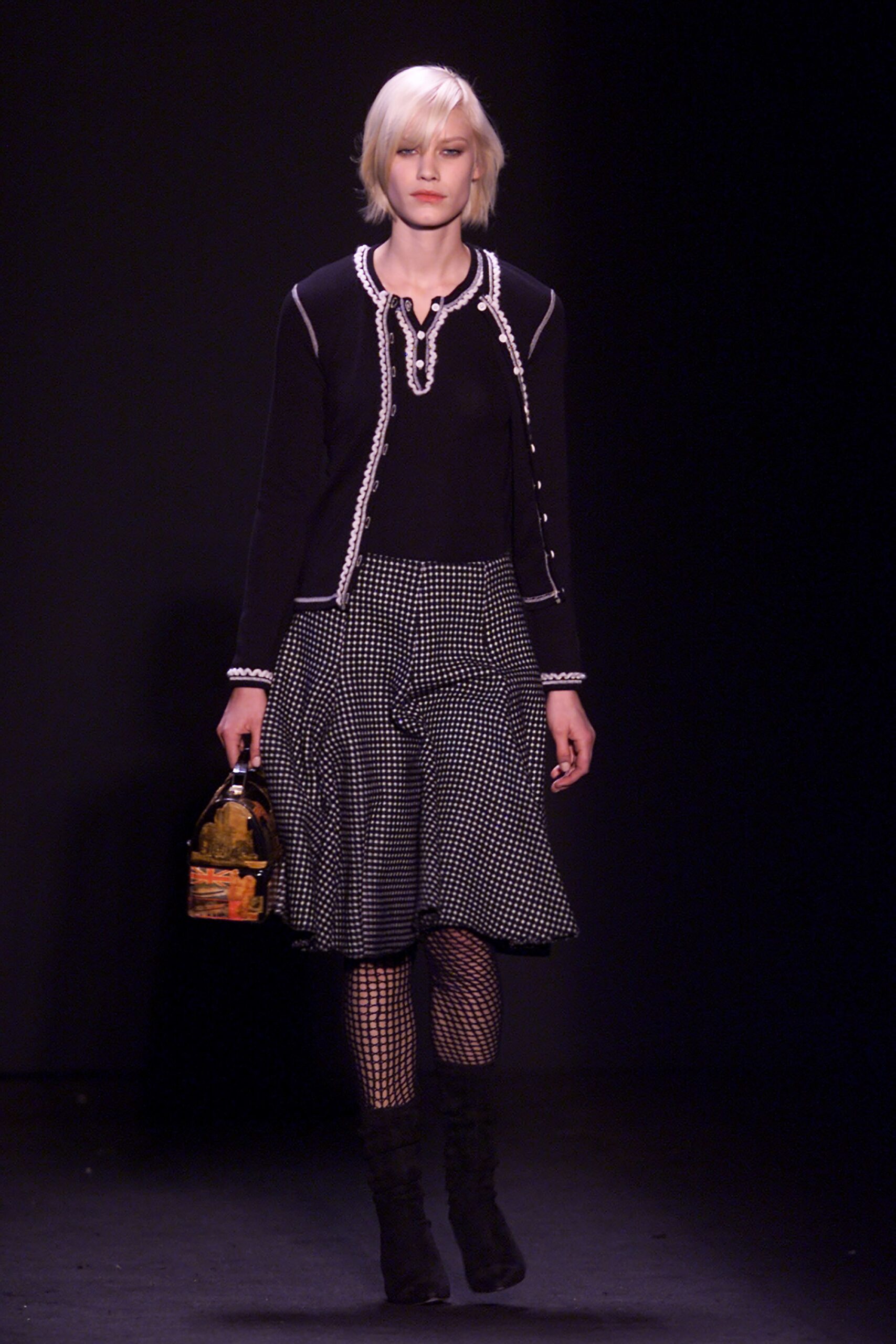 black cardigan with pleated skirt