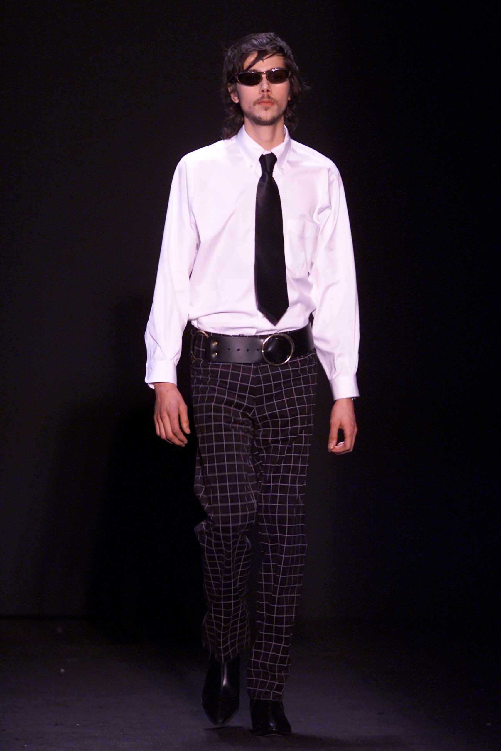 white fitted shirt with black pants