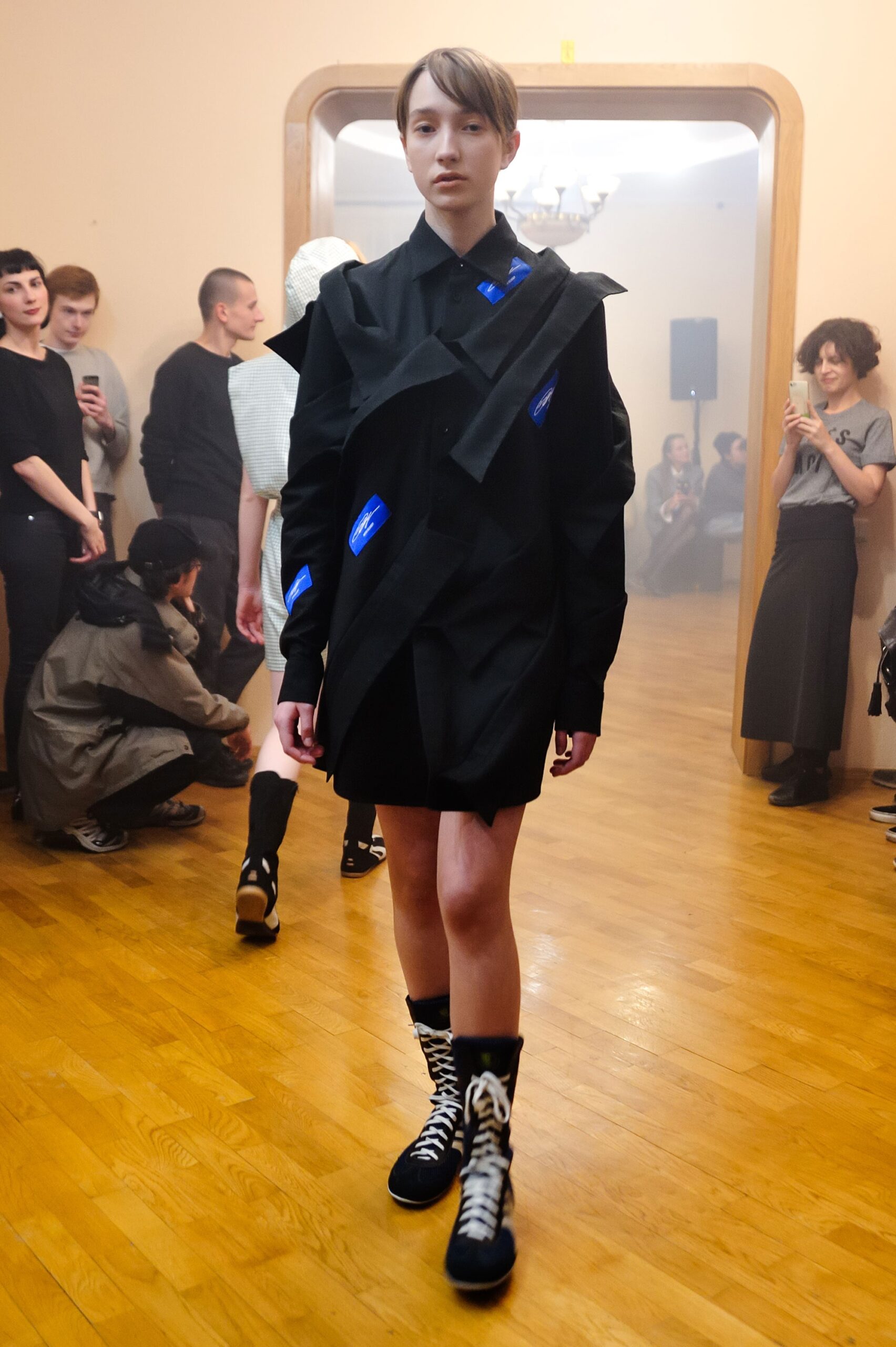 black relaxed dress with asymmetric design