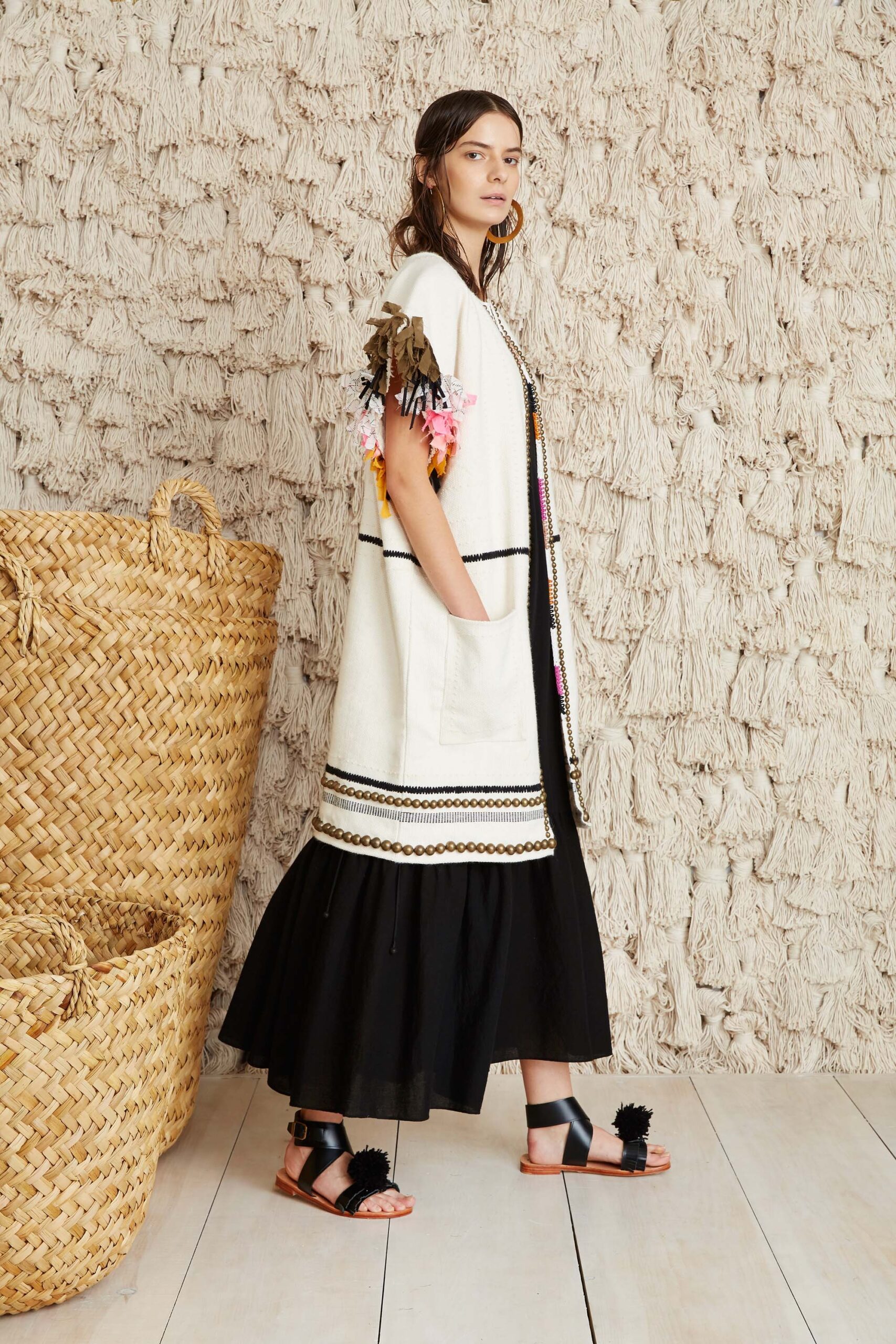 black midi dress with white coat