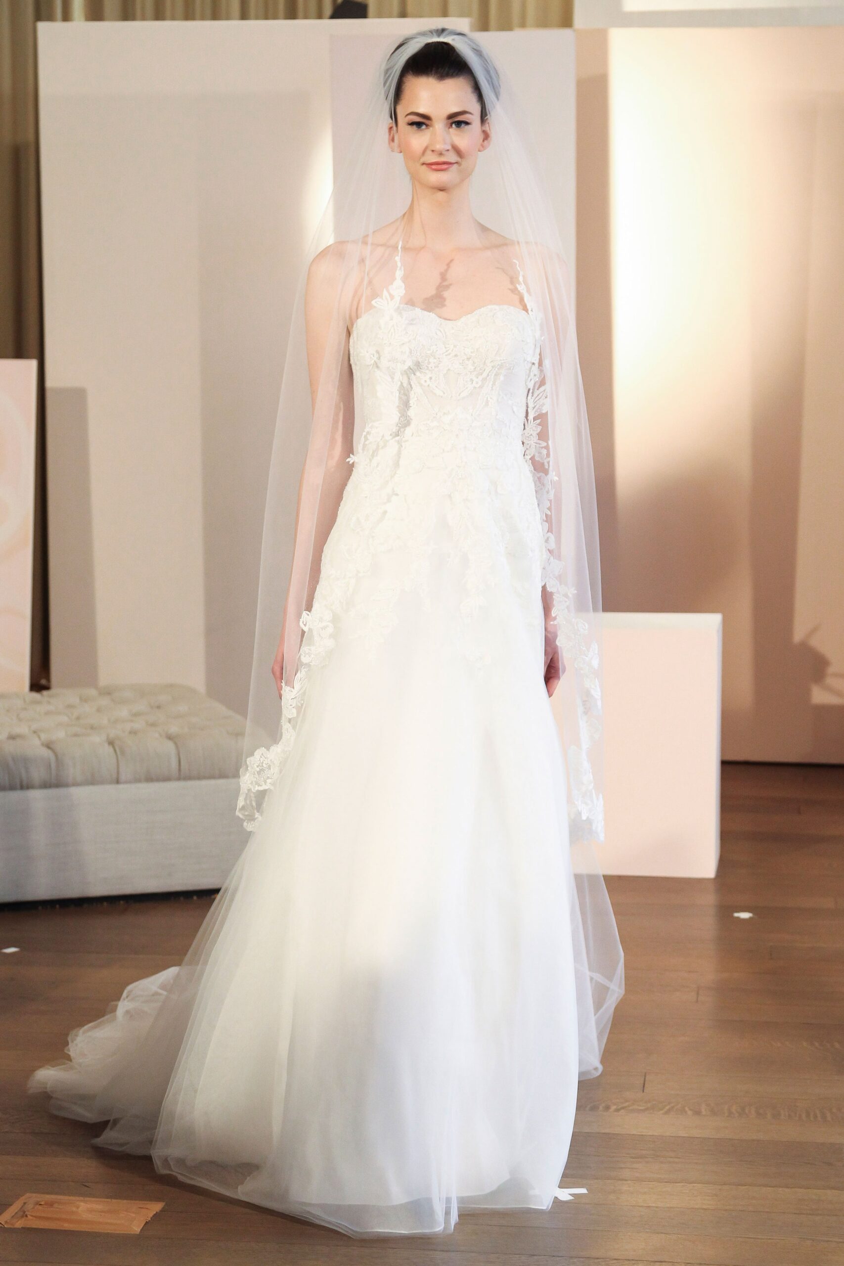 white lace embroidered gown