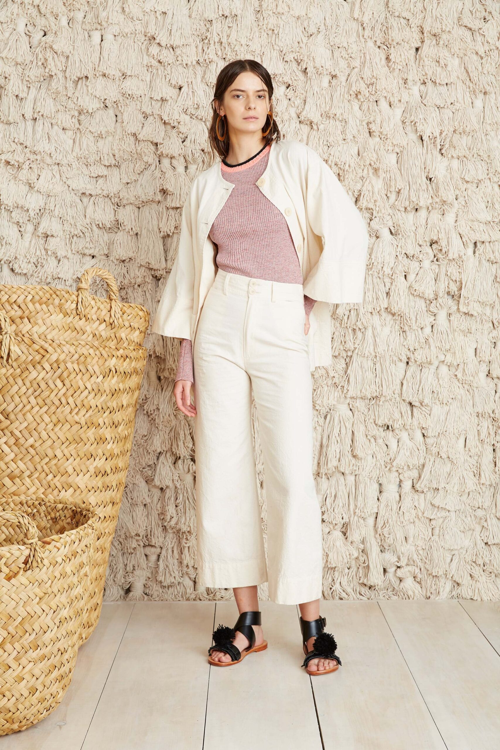 pink relaxed top with white tailored pants