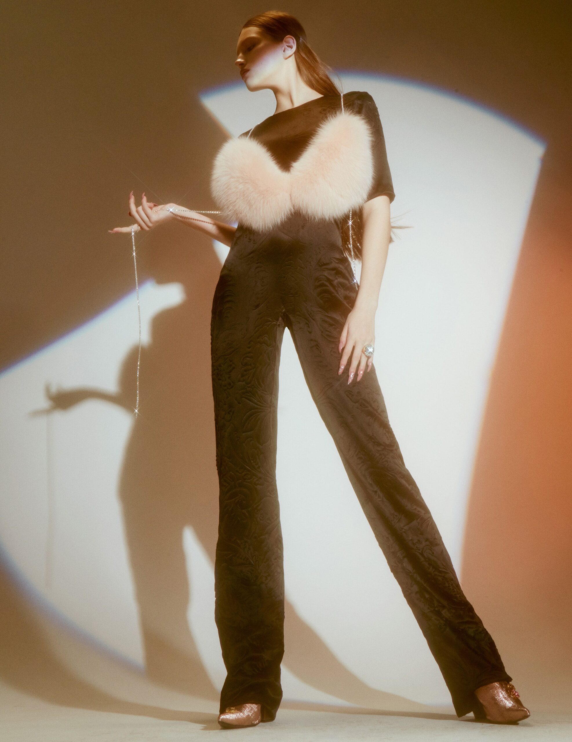 black silk fitted jumpsuit with pink fur