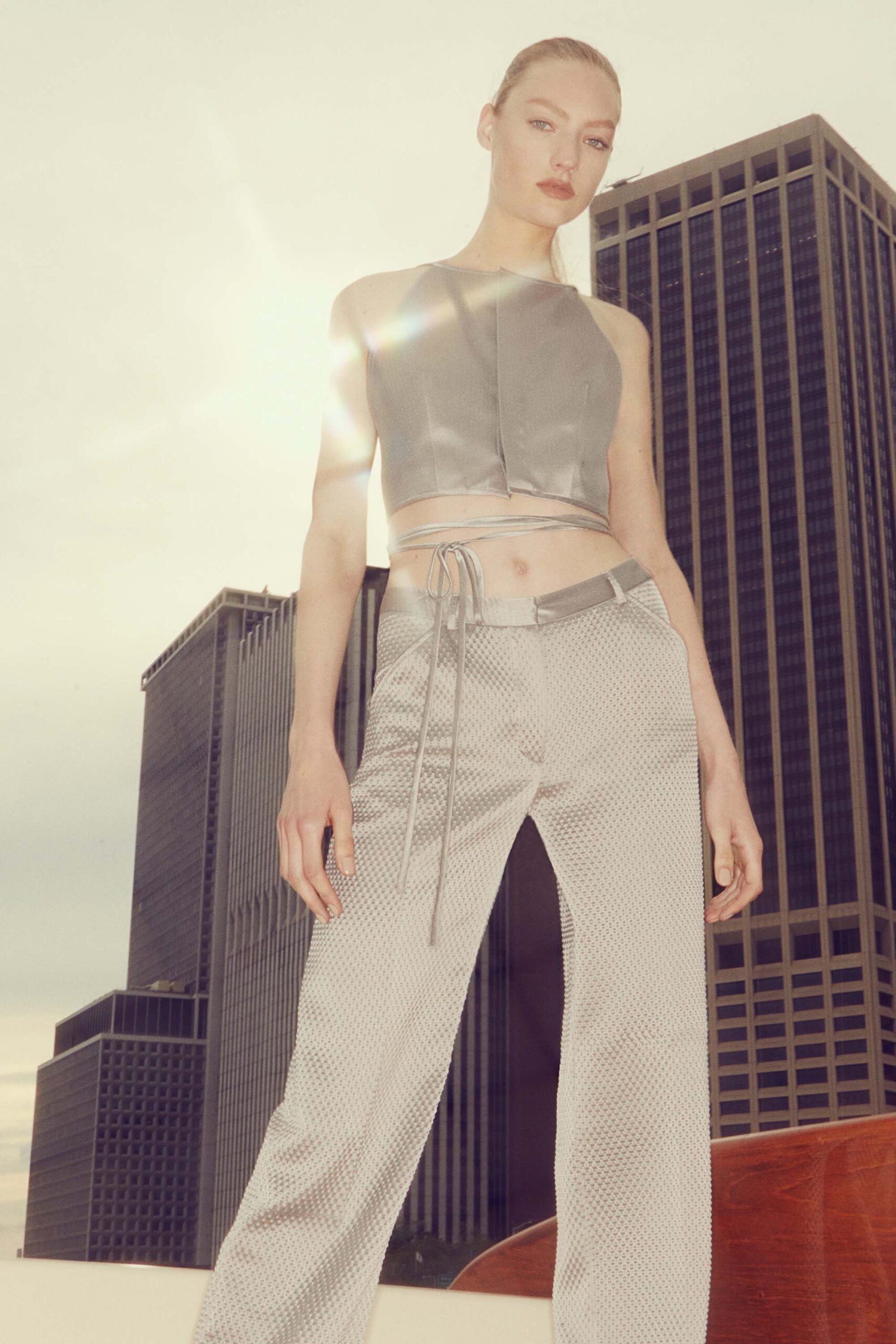 gray silk sleeveless high-neck fitted zippered shiny top