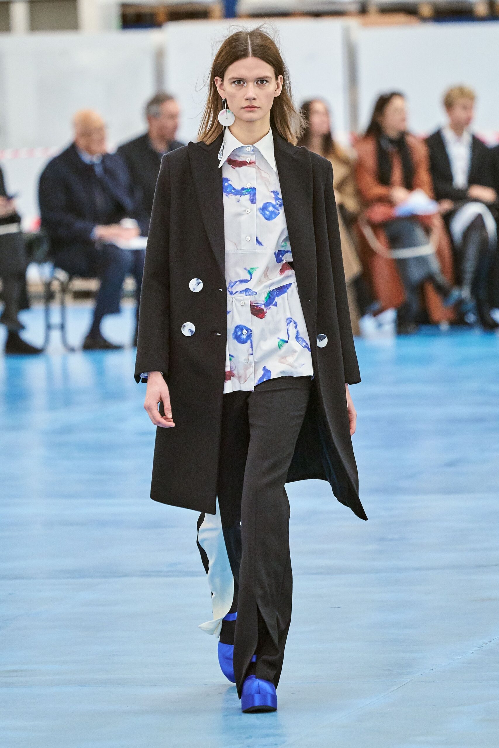 black coat with printed shirt
