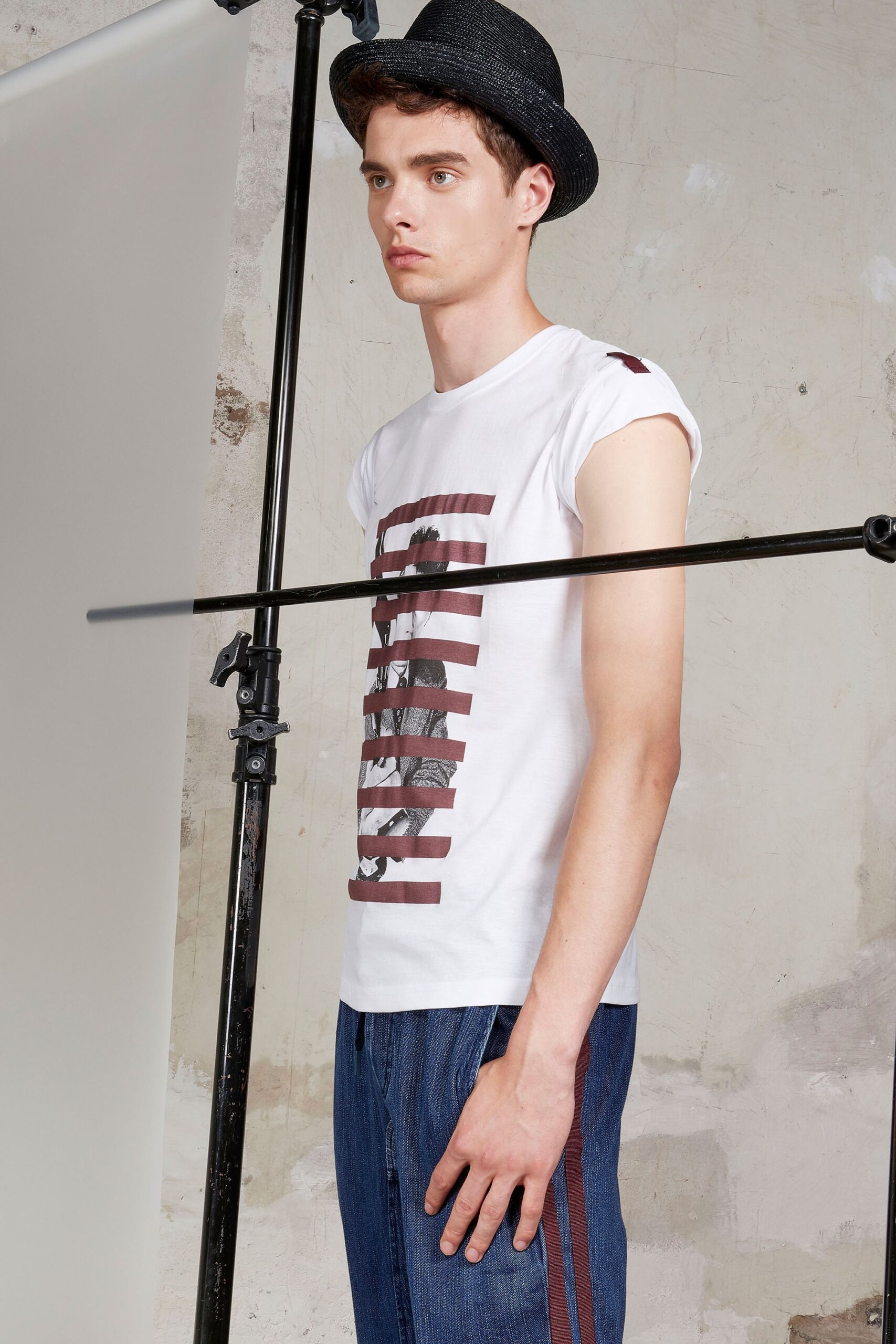 white printed t-shirt with blue pants