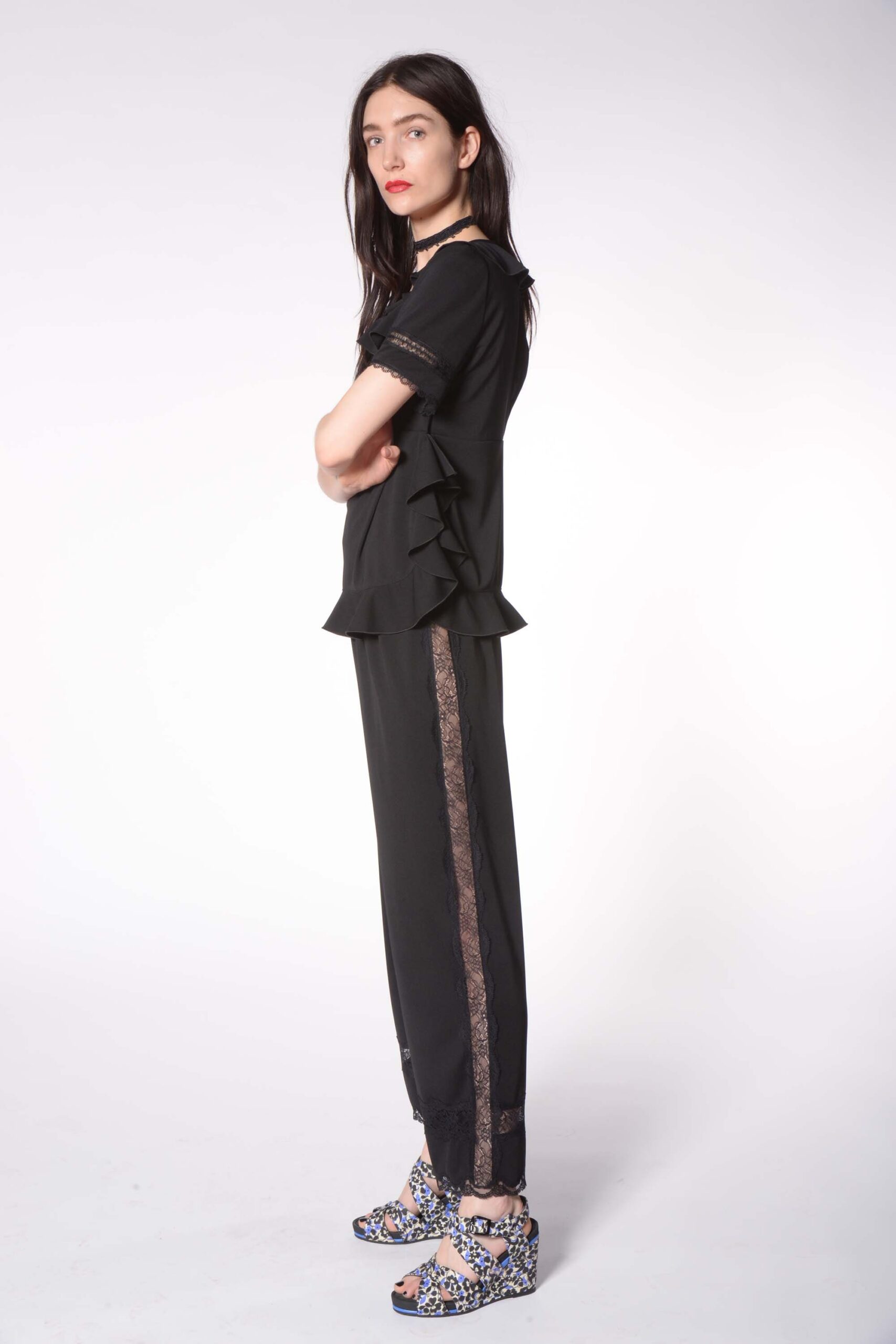 black fitted top and relaxed pants