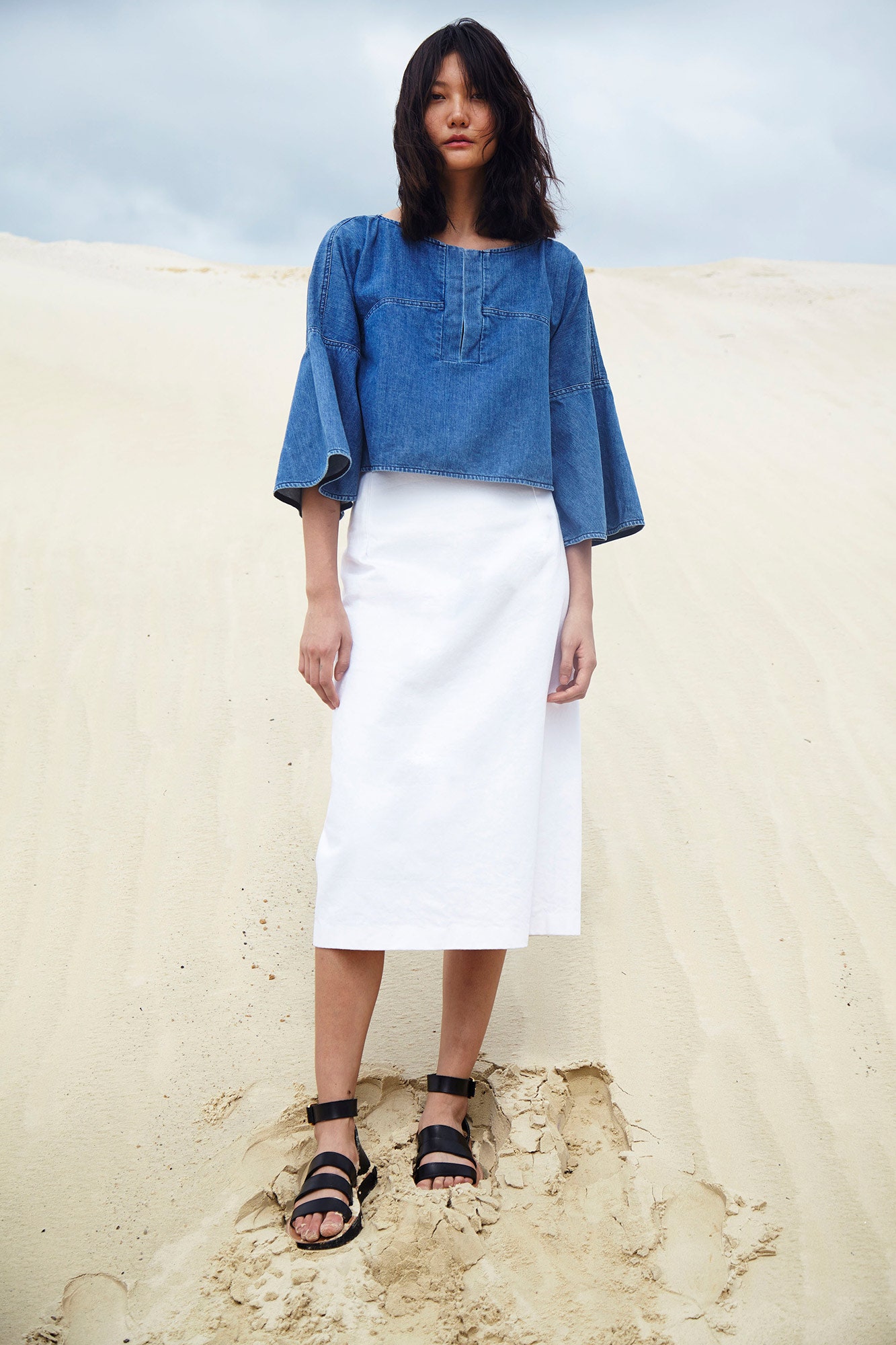blue denim long-sleeve collared relaxed pleated top