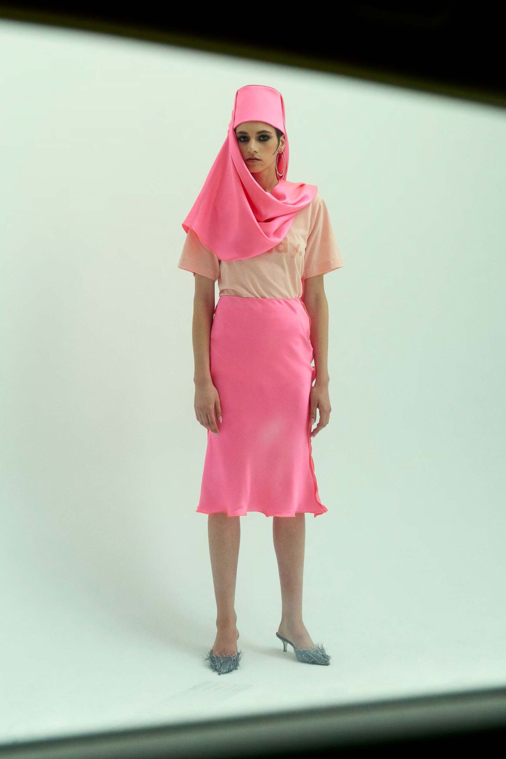 pink silk fitted top and skirt