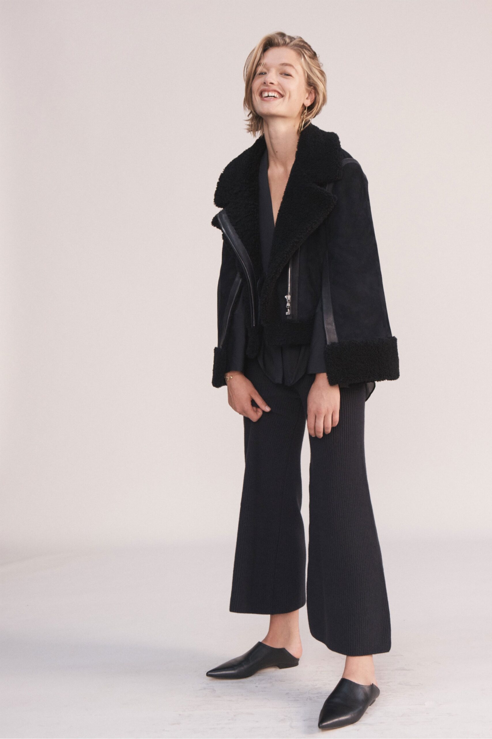 black suede jacket with flared pants