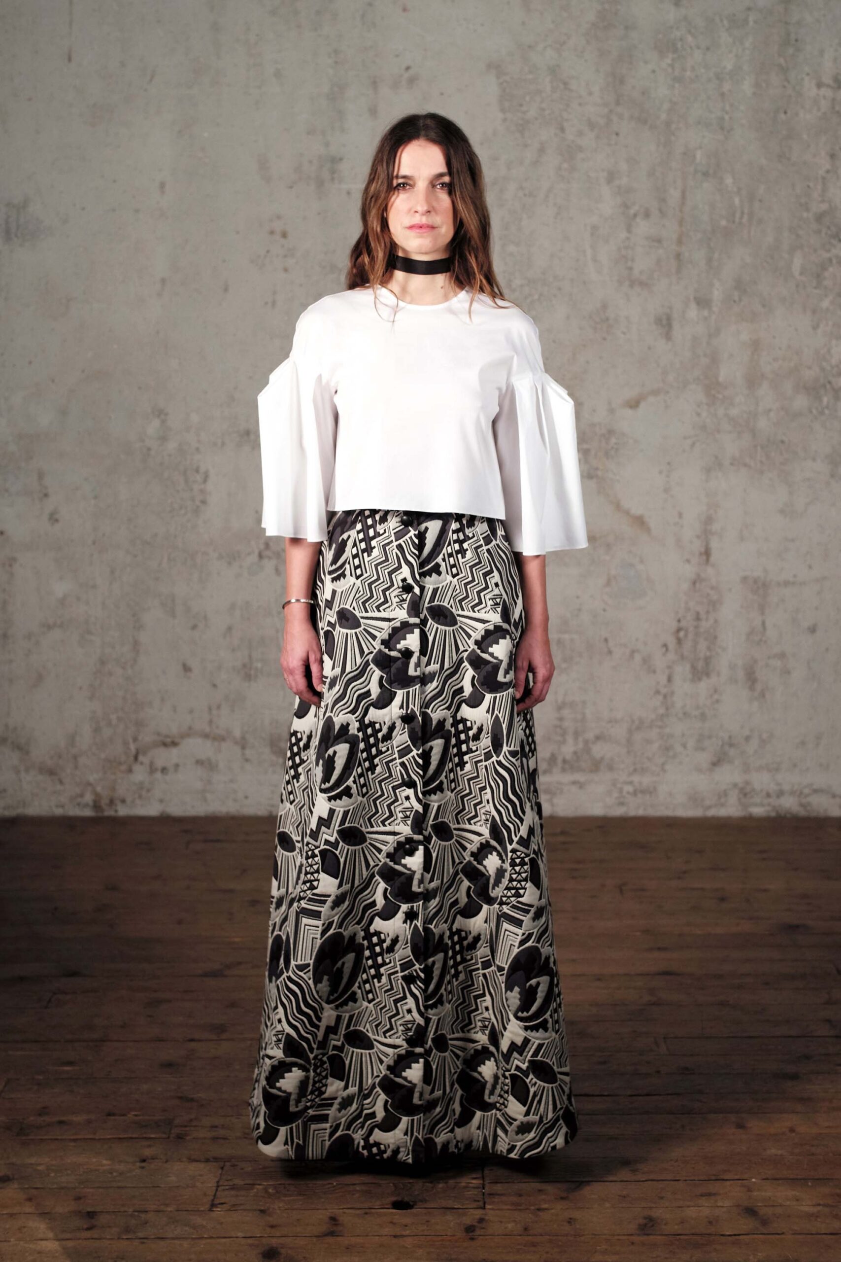 white relaxed top with flared skirt