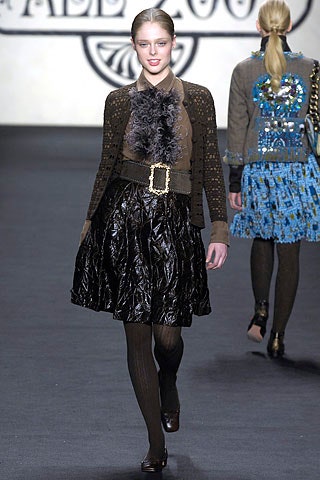 black pleated mini dress with cardigan