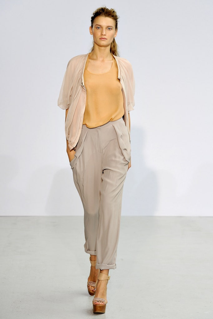beige silk top with gray pants
