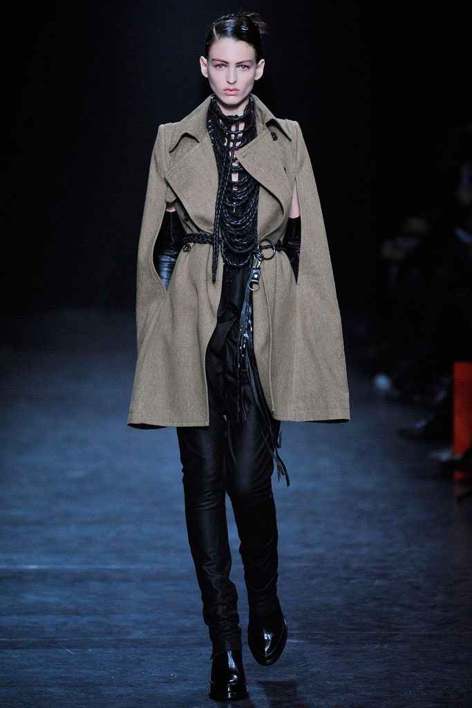 beige wool coat and black leather pants