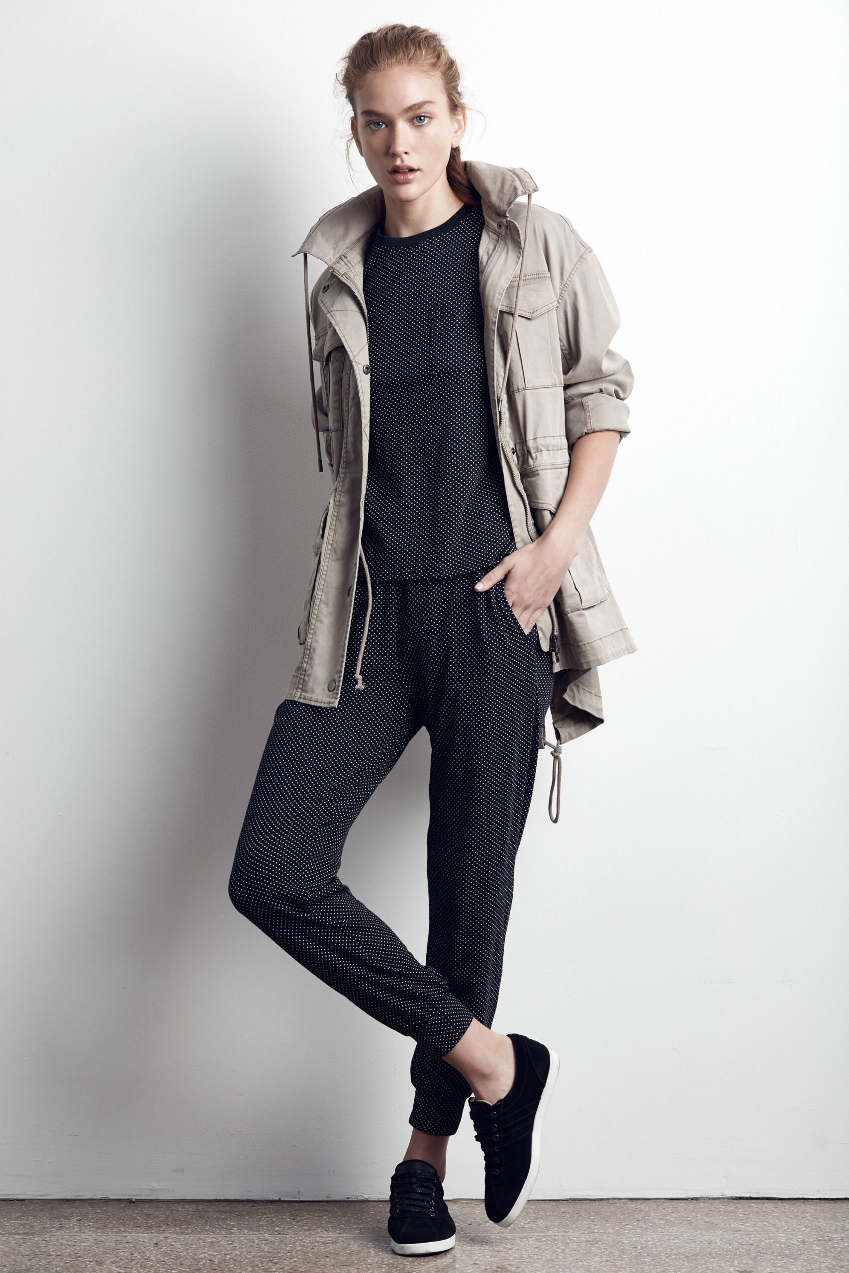 beige jacket with black outfit