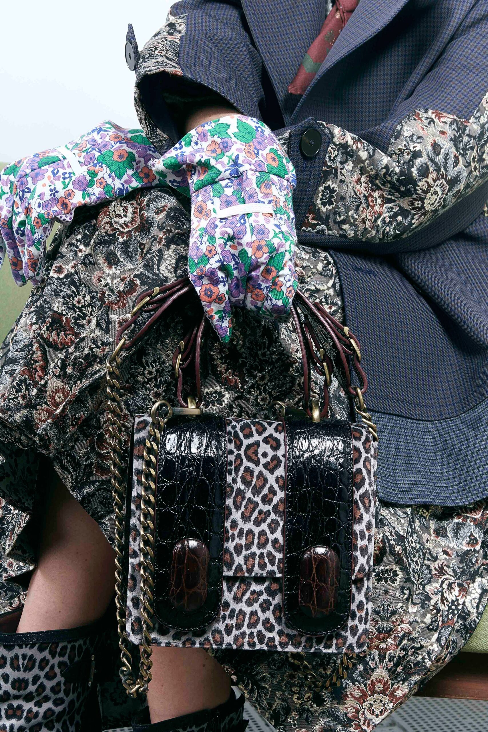 gray floral coat with animal-print bag