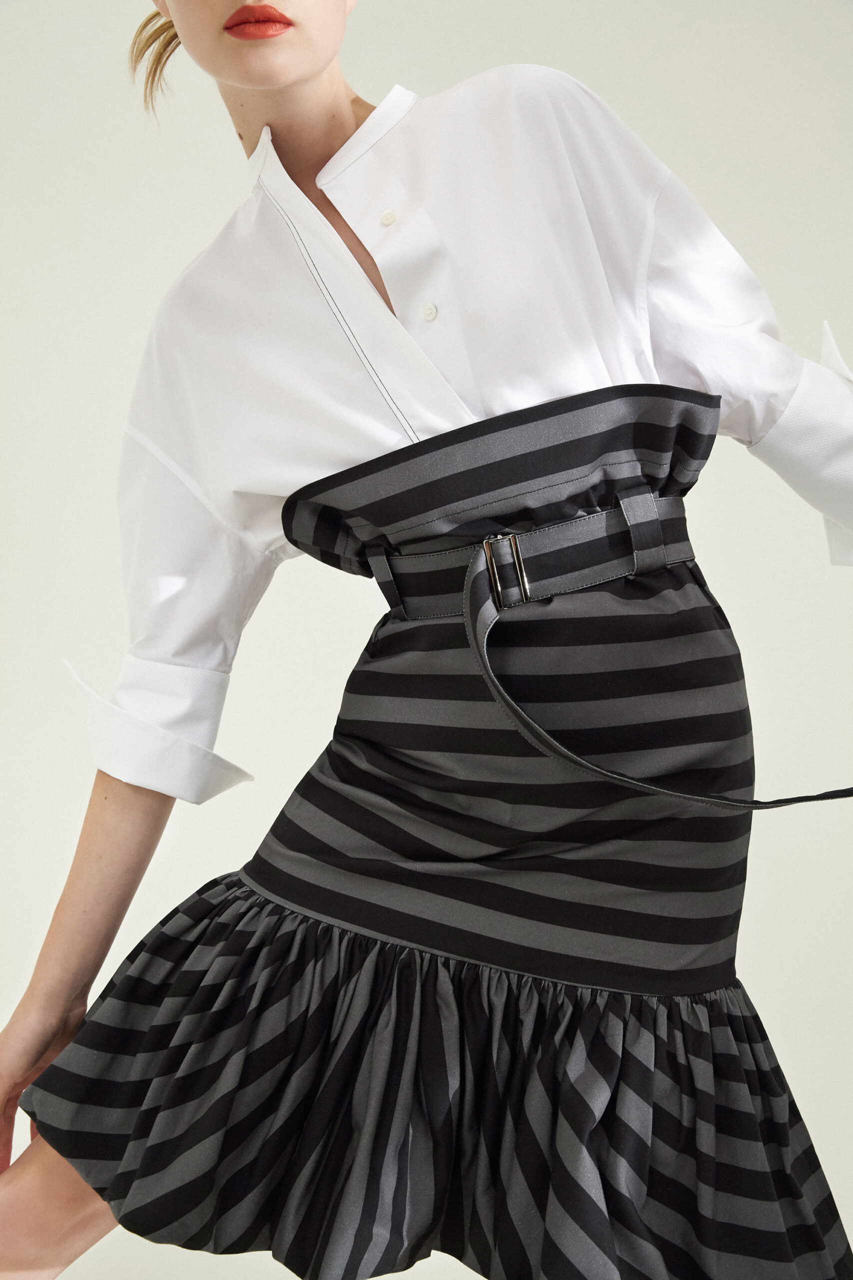 white cotton blouse with striped skirt