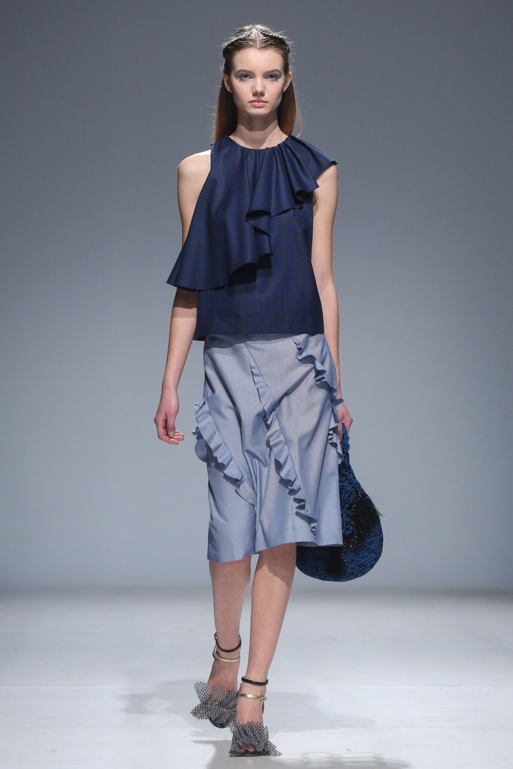 blue ruffled top and skirt