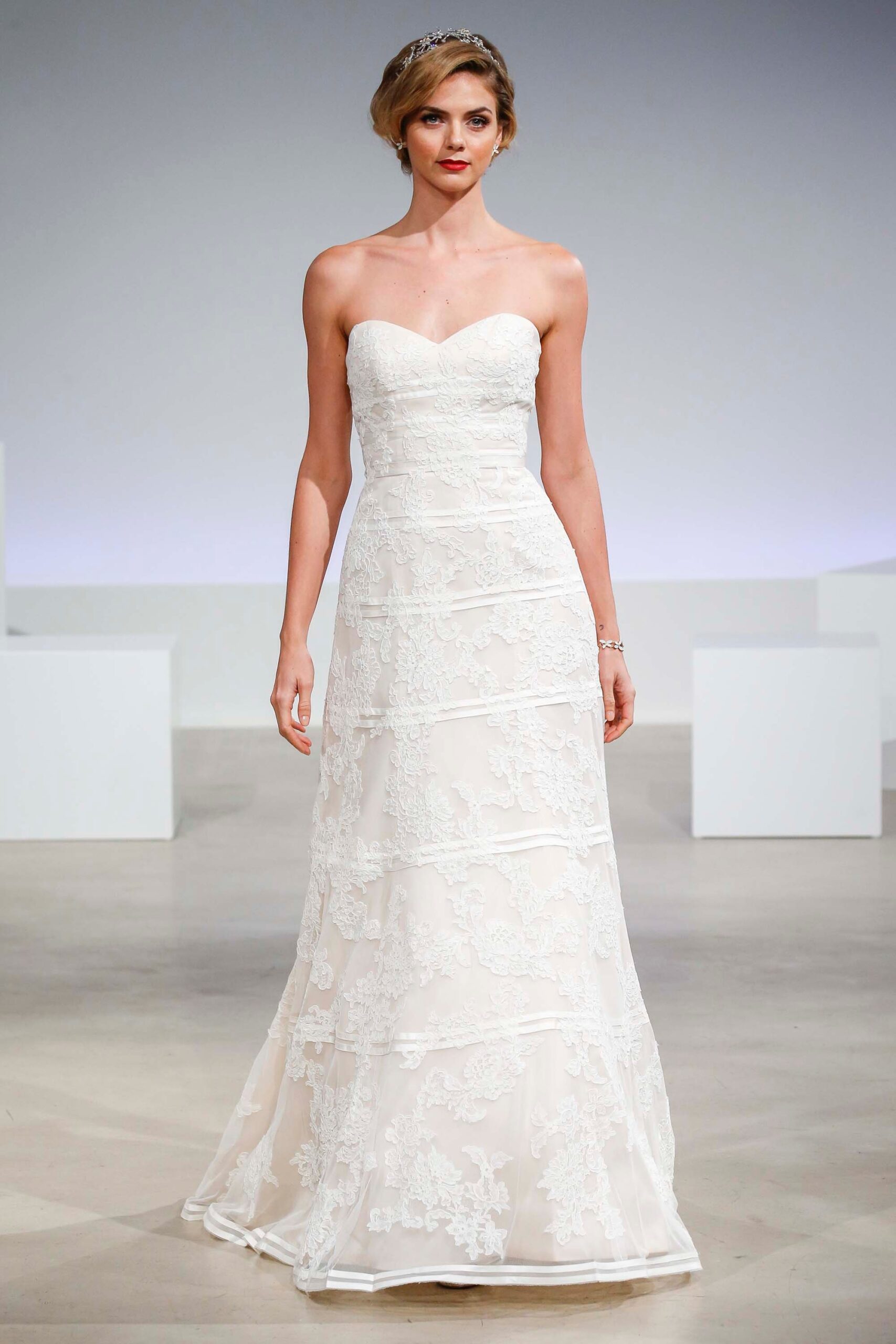 white strapless embroidered gown