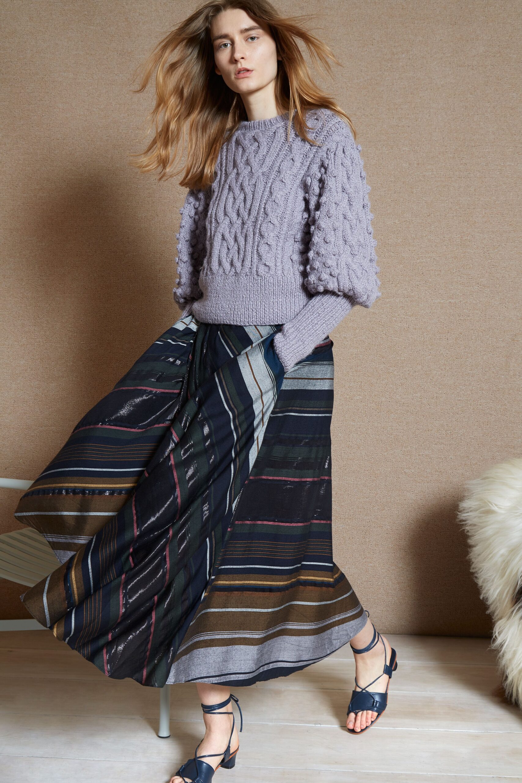 purple wool relaxed sweater and striped maxi skirt