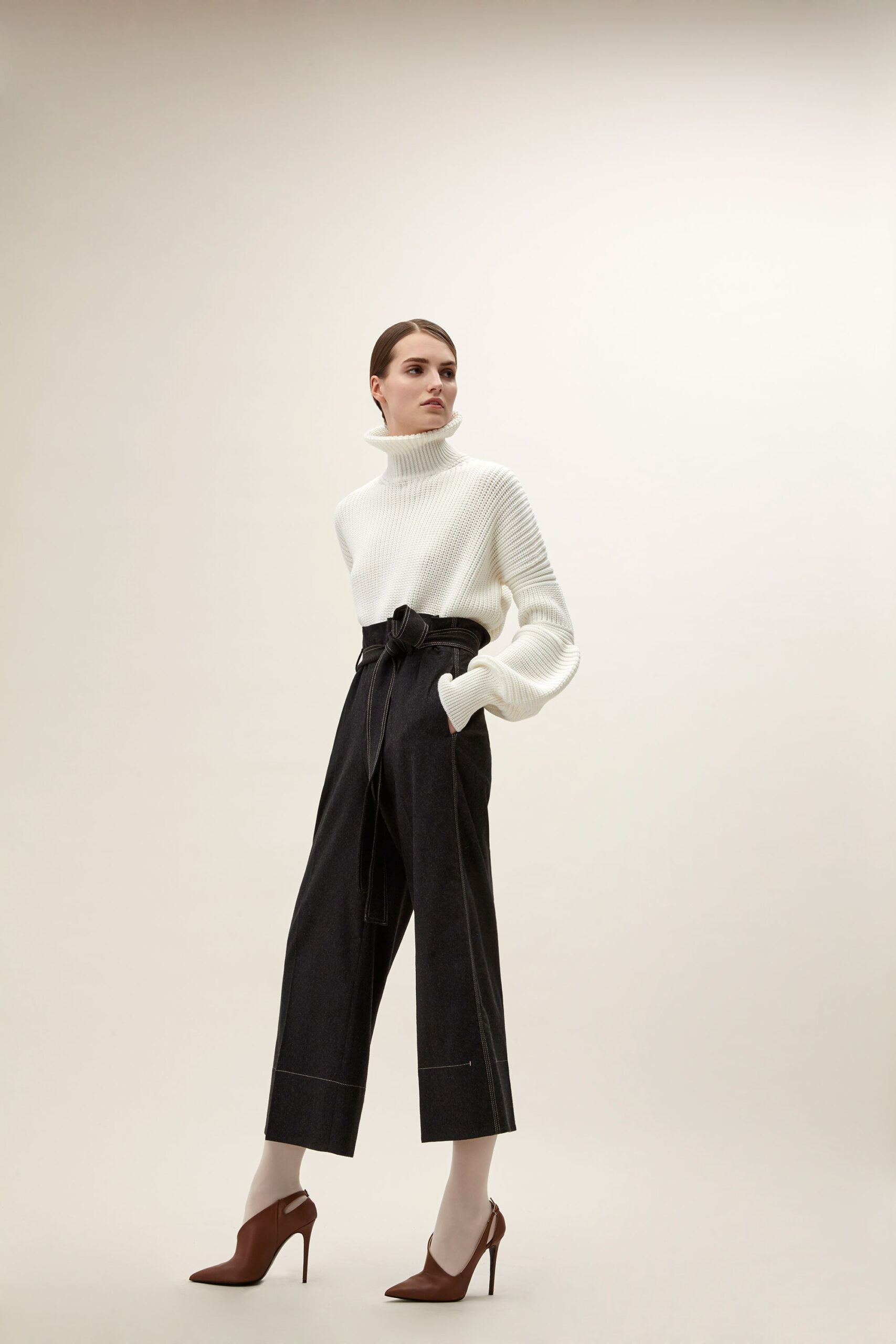 white fitted sweater black relaxed pants