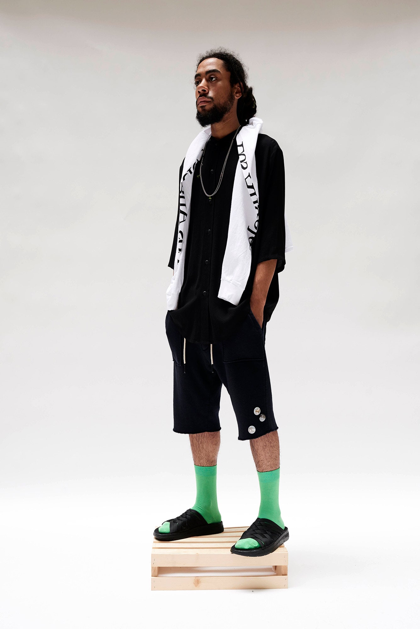 black relaxed shirt with navy shorts