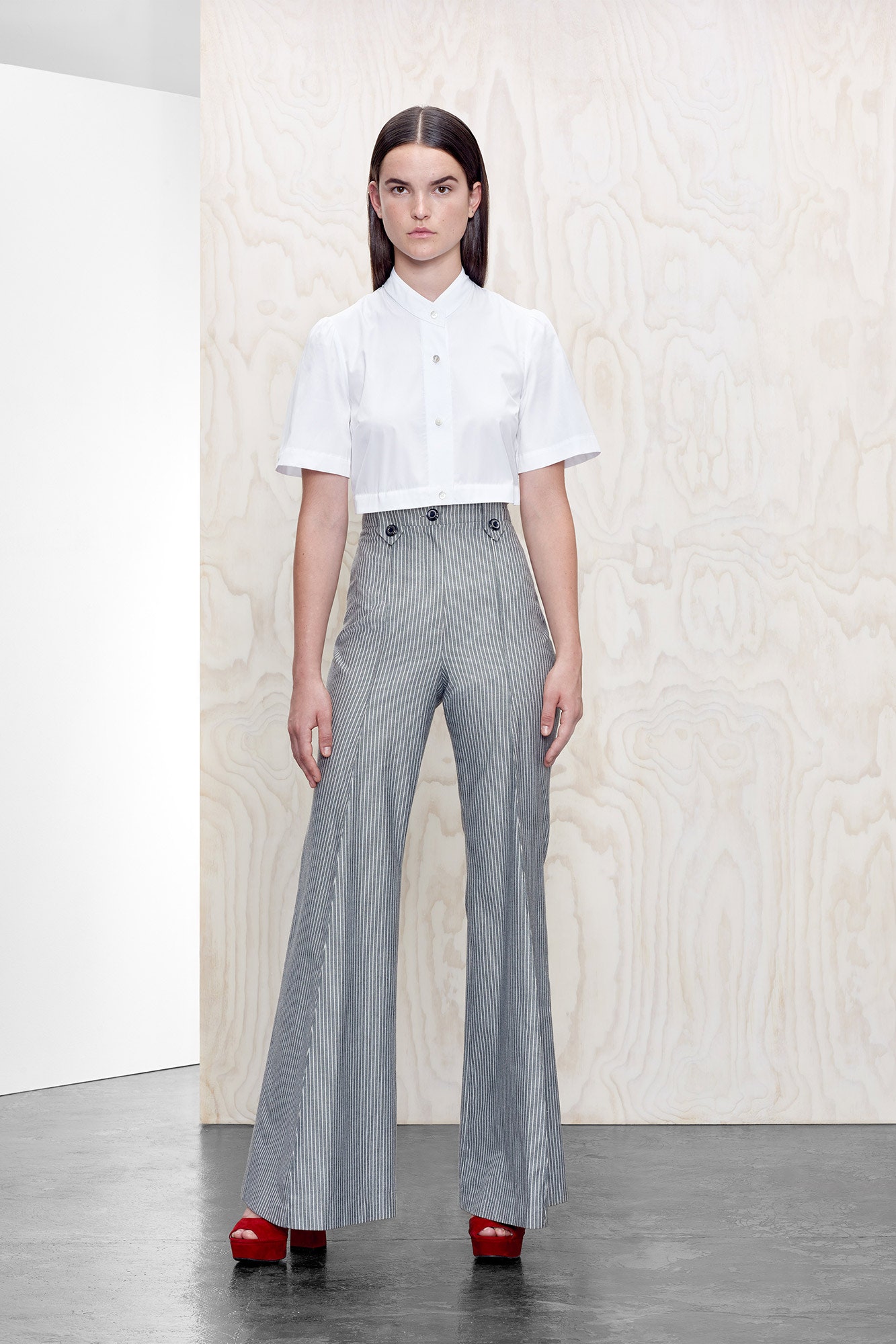 white cropped top gray flared pants