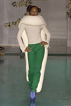 white fitted top with green pants
