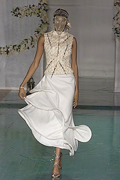 white silk fitted top and skirt