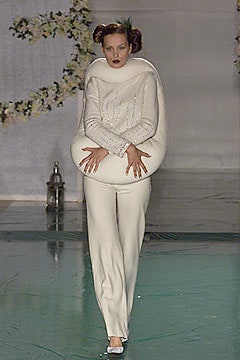 white relaxed sweater with fitted pants