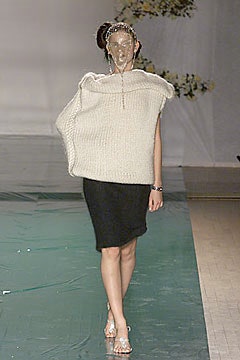 oversized white knit top with black pencil skirt