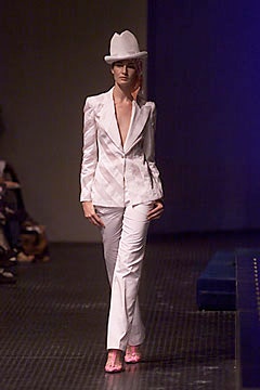 white tailored suit with pink shoes