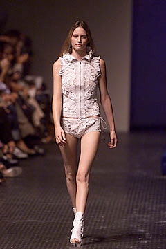 white ruffled sleeveless top with shorts