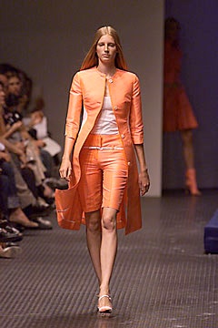 orange coat and shorts ensemble