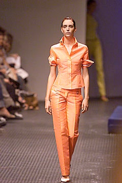 fitted orange shirt and pants