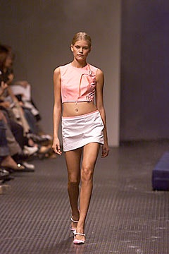 pink fitted top with ruffle and white mini skirt