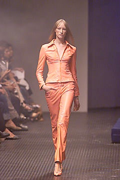 fitted orange vinyl suit