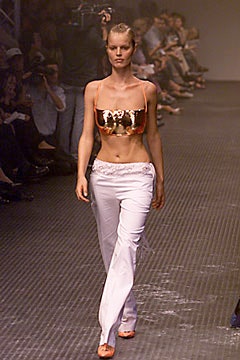 gold embellished crop top with white pants