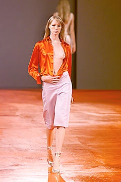 orange silk shirt and pink shorts