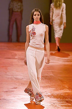 white fitted top with embroidered flowers