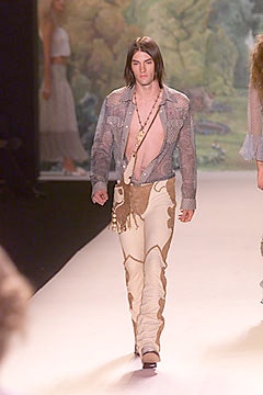 relaxed blue shirt and flared beige pants