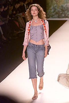 pink embroidered jacket with blue top