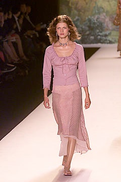 pink fitted blouse and skirt