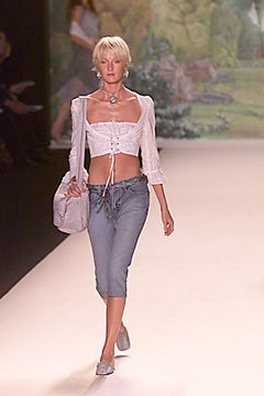 fitted white top and blue denim pants