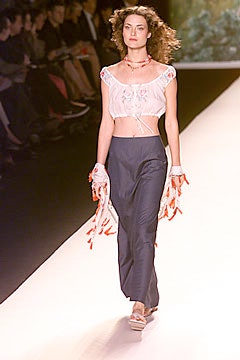 white embroidered crop top and blue pants