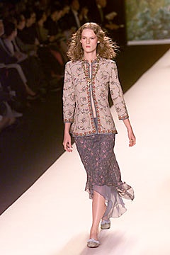 beige embroidered blouse with purple skirt