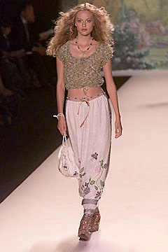 green embroidered cropped top and white relaxed pants