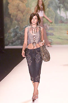 gray fitted top with blue pants