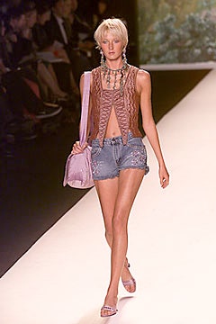 brown fitted sleeveless top with denim shorts