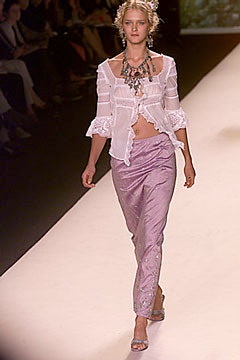 white ruffled blouse and pink pants